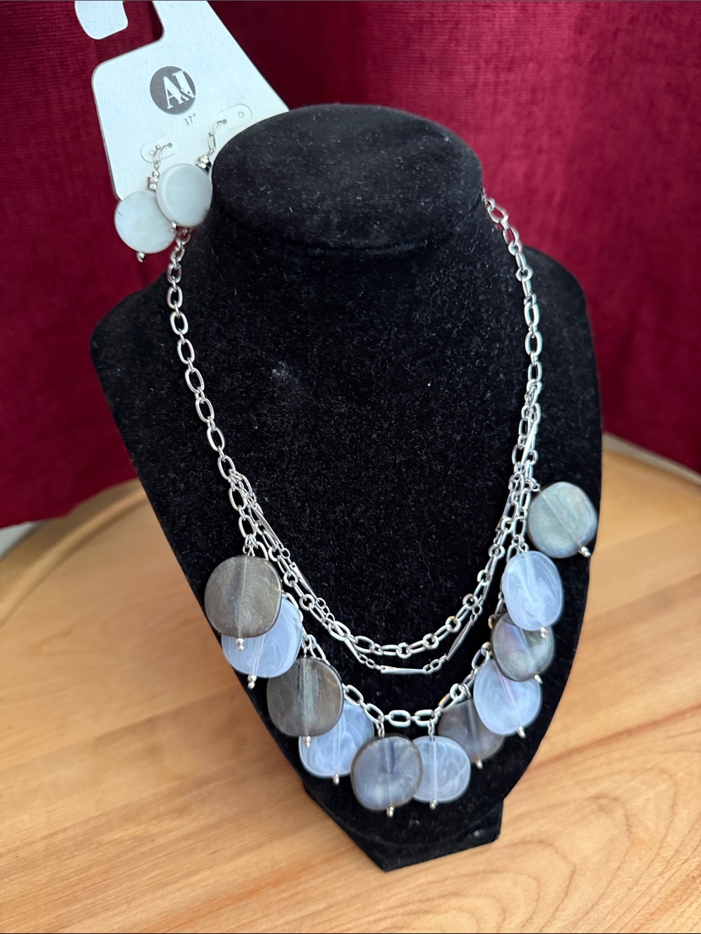Multi-Strand Silver Necklace with Blue and Gray Disc Accents